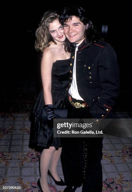 Actress Drew Barrymore and actor Corey Feldman attend the Fourth Annual American Cinematheque Award Salute to Steven Spielberg on April 1, 1989 at...