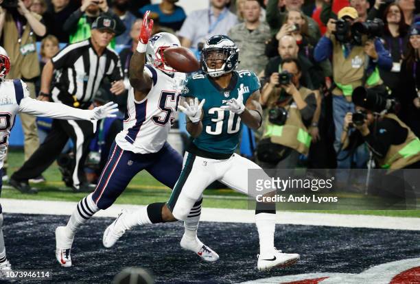 Corey Clement of the Philadelphia Eagles catches a touchdown pass against the New England Patriots during Super Bowl LII at U.S. Bank Stadium on...