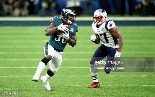 Corey Clement of the Philadelphia Eagles runs with the ball against the New England Patriots during Super Bowl LII at U.S. Bank Stadium on February...