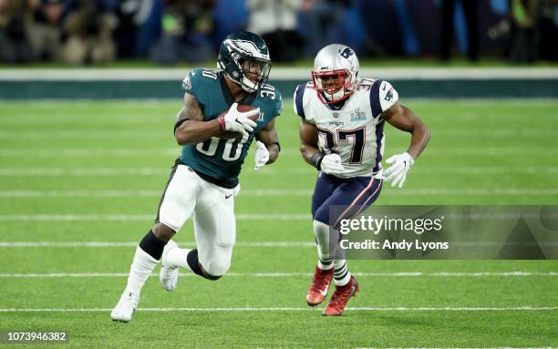 Corey Clement of the Philadelphia Eagles runs with the ball against the New England Patriots during Super Bowl LII at U.S. Bank Stadium on February...