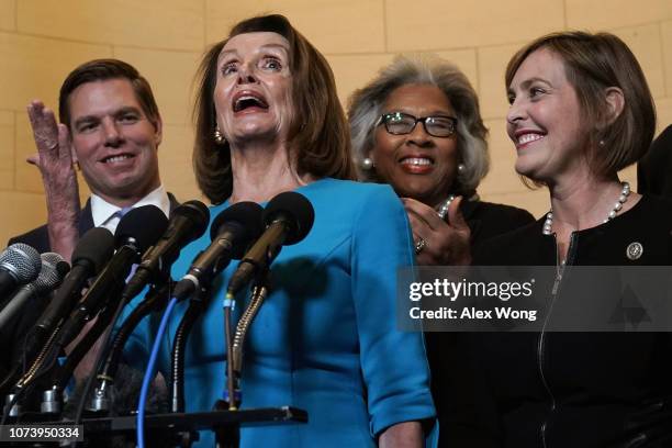 House Minority Leader Rep. Nancy Pelosi speaks to members of the media as Rep. Eric Swalwell , Rep. Joyce Beatty , Rep. Kathy Castor listen at the...