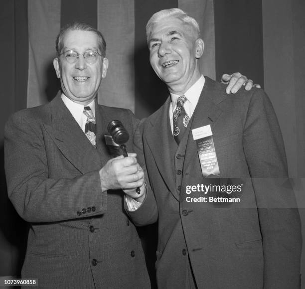 Hugh Willett is shown receiving the gavel from Karl Lieb, retiring president of the NCAA. Photo by Bettmann Archive/Getty Images)