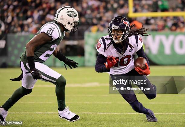 Wide receiver DeAndre Hopkins of the Houston Texans makes a first-down reception against cornerback Morris Claiborne of the New York Jets in the...