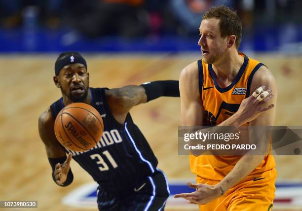 Orlando Magic's Terrence Ross vies for the ball with Utah Jazz's Joe Ingles during an NBA Global Games match at the Mexico City Arena, on December 15...