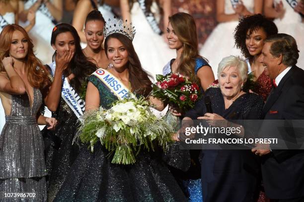Newly elected Miss France 2019, Miss Tahiti Vaimalama Chaves poses on stage with the runners-up, Miss France 2018 Maeva Coucke , French actress and...