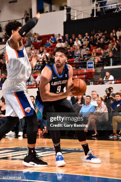 Byron Mullens of the Lakeland Magic jocks for a position during the game against the Westchester Knicks on November 10, 2018 at RP Funding Center in...