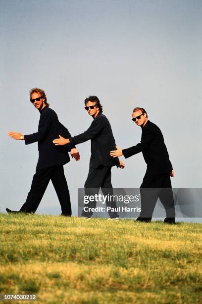 We Can't Dance American Tour Of Genesis, Mike Rutherford, Tony Banks and Phil Collins seen in a cornfield, January 1, 1992 Des Moines, Iowa