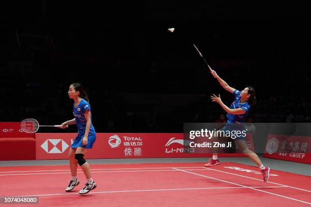 Misaki Matsutomo and Ayaka Takahashi of Japan compete against Lee So Hee and Shin Seung Chan of Korea during their women's doubles final match on day...