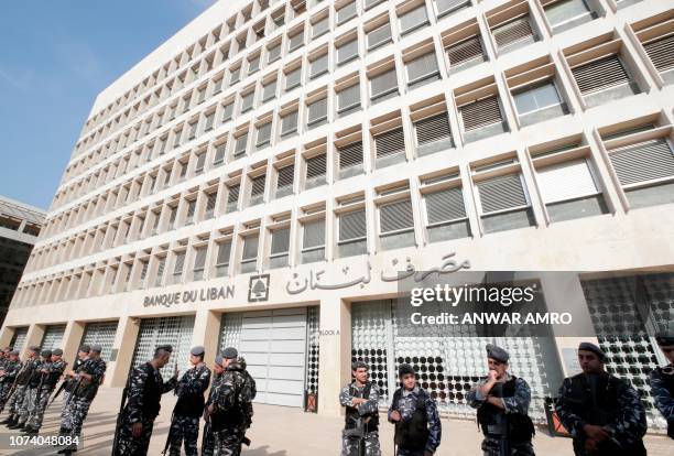 Picture taken on December 16 shows Lebanese policemen standing guard outside the Central Bank in the capital Beirut.