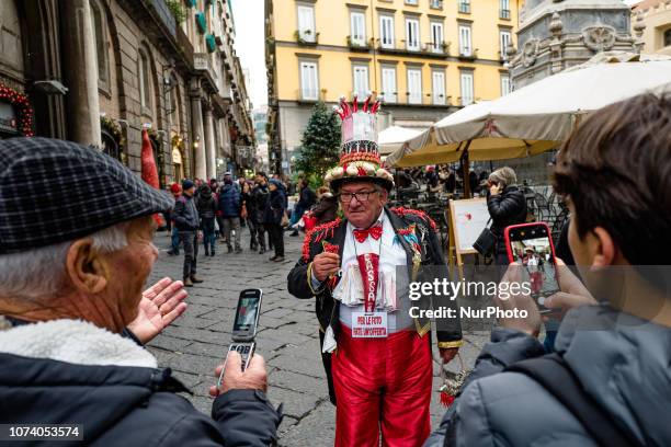 Walk through the streets of Naples from San Gregorio Armeno to the Quartieri Spagnoli, to the Vomero, on 15 December 2018 to the fish market, to the...