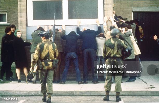 British troops search civilians on the day of the Bloody Sunday massacre, when British Paratroopers shot dead 13 civilians on a civil rights march in...