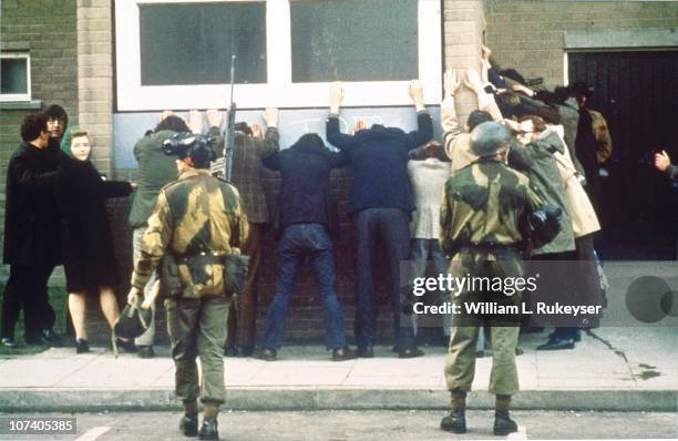 British troops search civilians on the day of the Bloody Sunday massacre, when British Paratroopers shot dead 13 civilians on a civil rights march in...