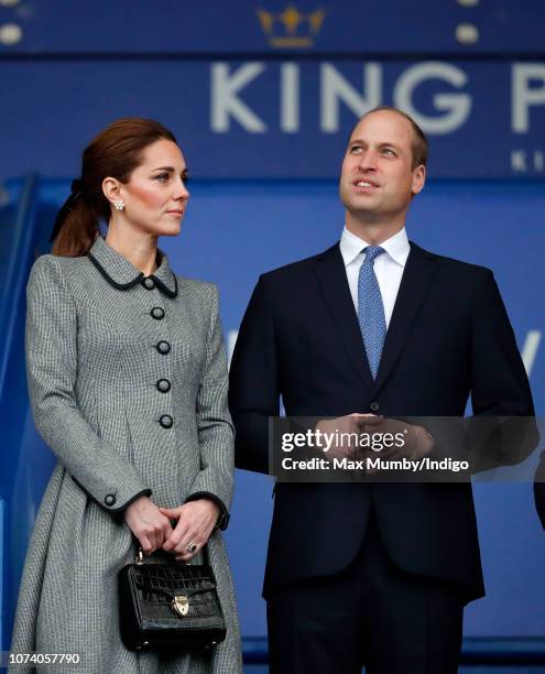 Catherine, Duchess of Cambridge and Prince William, Duke of Cambridge visit Leicester City Football Club's King Power Stadium to pay tribute to those...