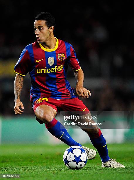 Thiago Alcantara of Barcelona runs with the ball during the Champions League match between Barcelona and Rubin Kazan at Camp Nou Stadium on December...