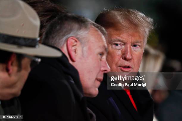 President Donald Trump and U.S. Secretary of Interior Ryan Zinke attend the 96th annual National Christmas Tree Lighting at The Ellipse in...