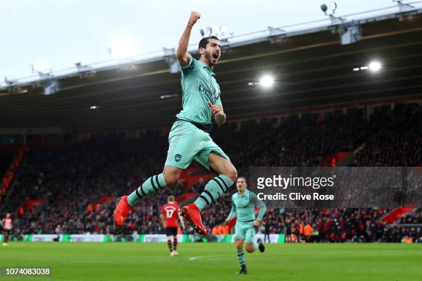 Henrikh Mkhitaryan of Arsenal celebrates after scoring his team's first goal during the Premier League match between Southampton FC and Arsenal FC at...