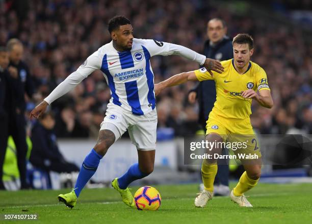 Jurgen Locadia of Brighton and Hove Albion battles for possession with Cesar Azpilicueta of Chelsea during the Premier League match between Brighton...