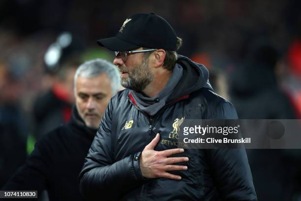 Jurgen Klopp, Manager of Liverpool and Jose Mourinho, Manager of Manchester United looks on prior to the Premier League match between Liverpool FC...