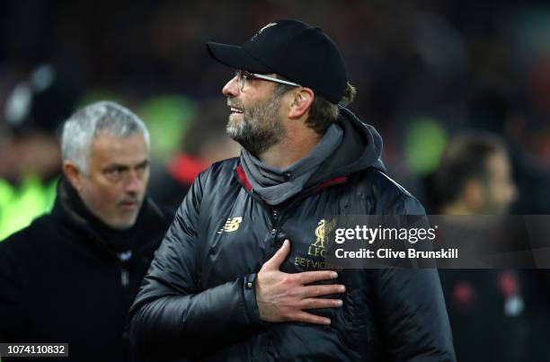 Jurgen Klopp, Manager of Liverpool and Jose Mourinho, Manager of Manchester United looks on prior to the Premier League match between Liverpool FC...