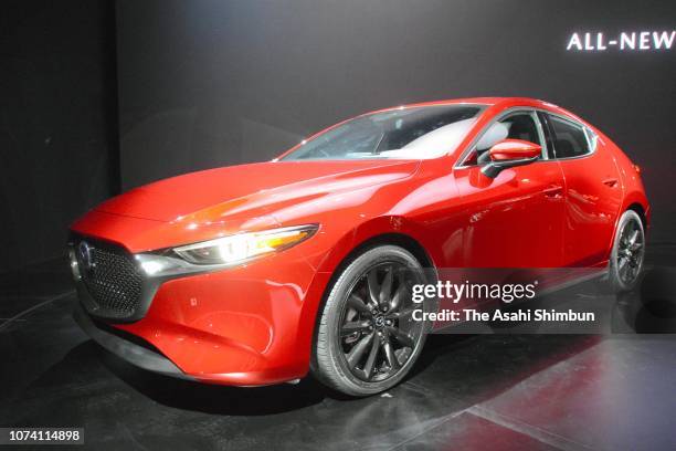 The all new Mazda3 is seen onstage during the Mazda press conference prior to the L.A. Auto Show on November 27, 2018 in Los Angeles, California.