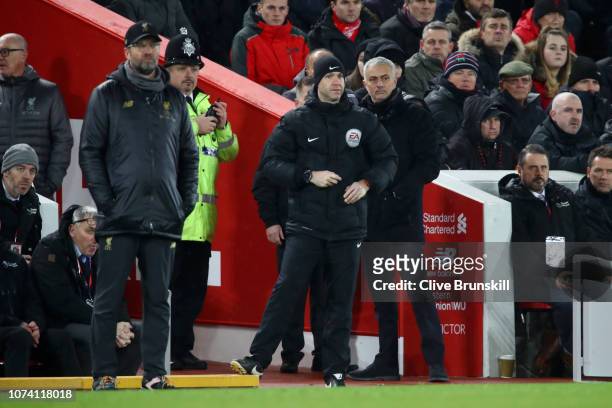 Jurgen Klopp, Manager of Liverpool and Jose Mourinho, Manager of Manchester United looks on during the Premier League match between Liverpool FC and...
