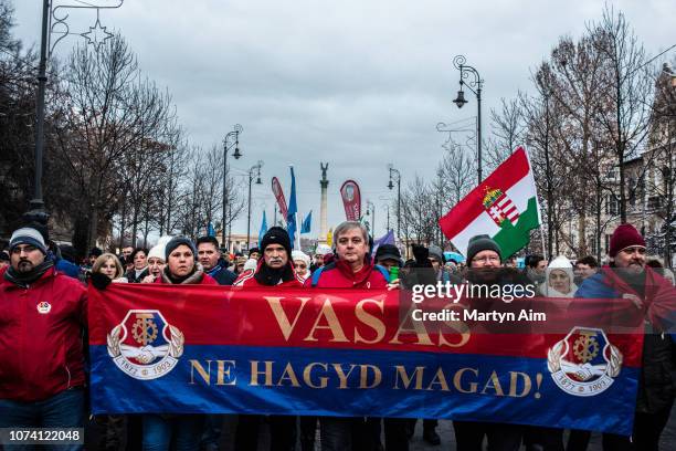 Trade Unionists join a wide range of political and civil groups in a march against exploitative changes to Hungary's labour laws on December 16, 2018...
