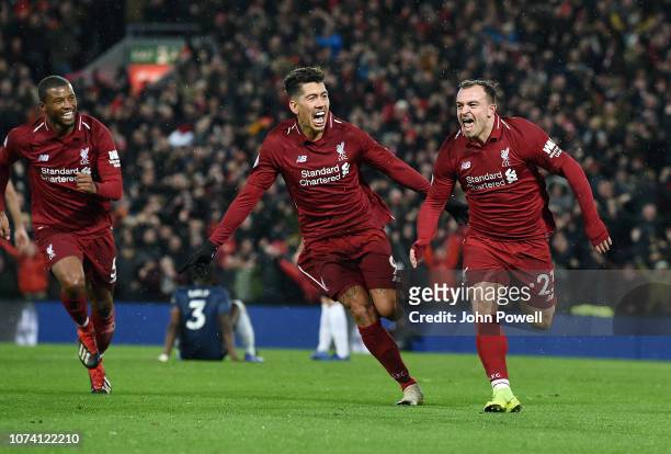 Xherdan Shaqiri of Liverpool Scores the Third goal and celebrates during the Premier League match between Liverpool FC and Manchester United at...