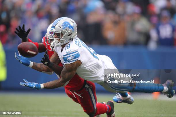 Kenny Golladay of the Detroit Lions cannot hold on to a pass in the second quarter during NFL game as TreDavious White of the Buffalo Bills plays...