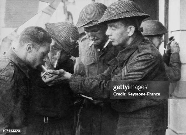 Soldiers Smoking Cigarettes After Dieppe Raid During World War Ii On August 20Th 1942