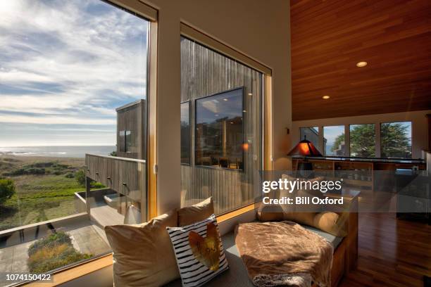 home interior: window seat by oceanfront home in california - sonoma county stock pictures, royalty-free photos & images