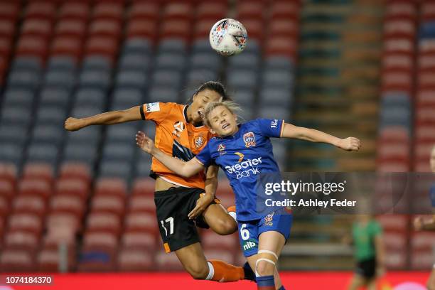 Cassidy Davis of Newcastle Jets contests the header against Yuki Nagasato of Brisbane Roar during the round five W-League match between the Newcastle...