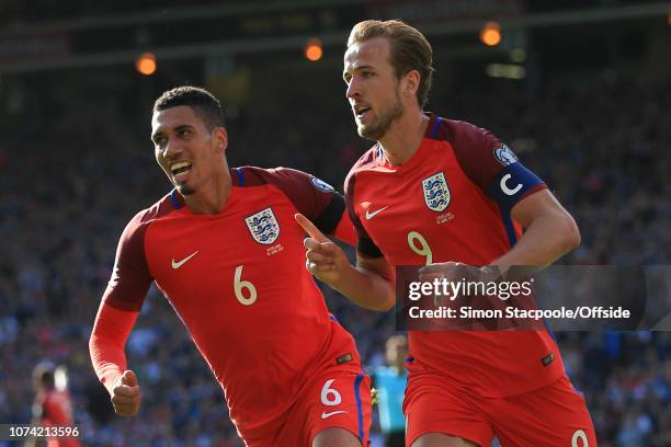 10th June 2017 - 2018 FIFA World Cup Qualifying - Scotland v England - Harry Kane of England celebrates with teammate Chris Smalling after scoring...