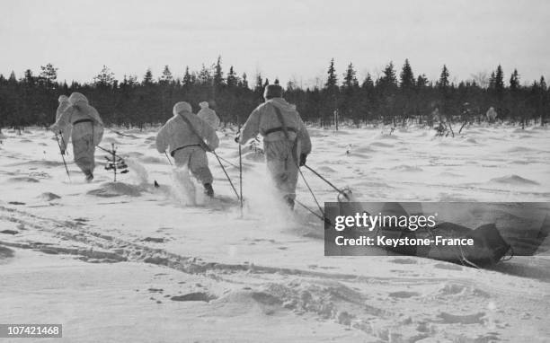 Finish Soldiers Hauling A Machine Gun On A Toboggan In Soviet Finnish War On March 1940