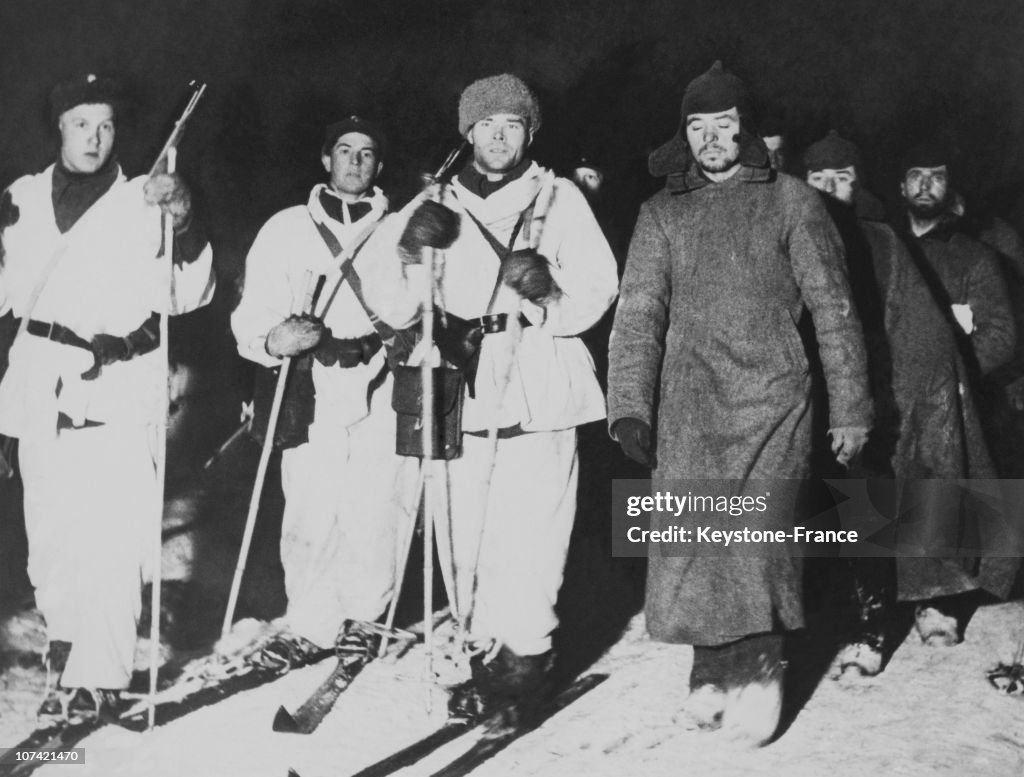 Finish Soldiers Bringing To Their Camp Russian Prisoners Of War In Soviet Finnish War On January 1940