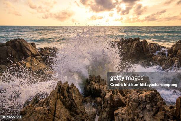 big crashing wave - waves crashing on rocks stock pictures, royalty-free photos & images