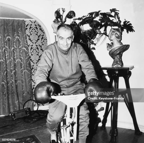 Louis De Funes On A Home Trainer During The Filming Of The Bons Vivants Movie In Paris On January 1965