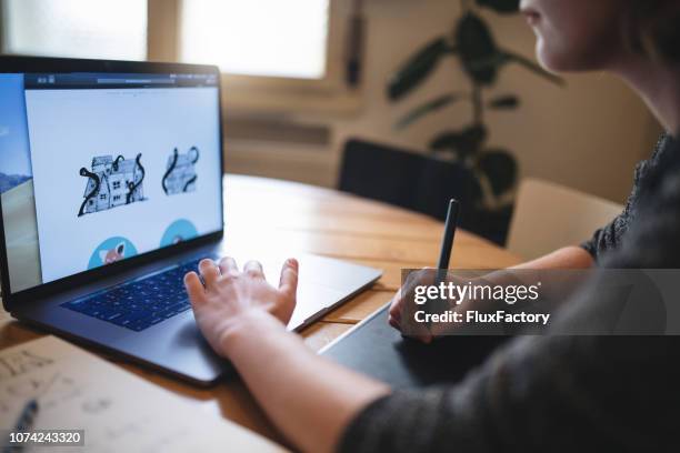 focused design student drawing illustrations - graphic designer stock pictures, royalty-free photos & images