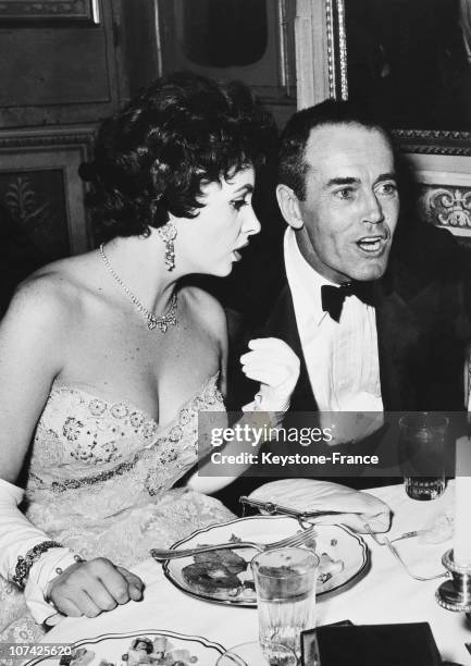 Circa 1965: Henry Fonda And Gina Lollobrigida Taking Dinner