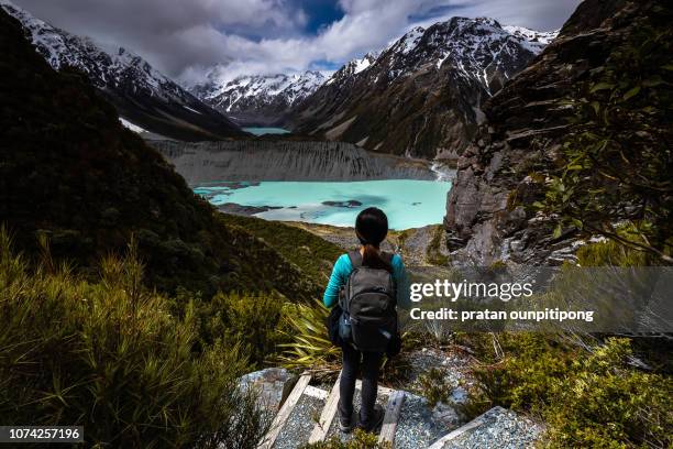 steps to sealy tarn and view of mueller and hooker lake - mt cook national park stockfoto's en -beelden