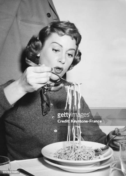 Martine Carol Eating Spaghetti In A Restaurant In Italy On March 1956