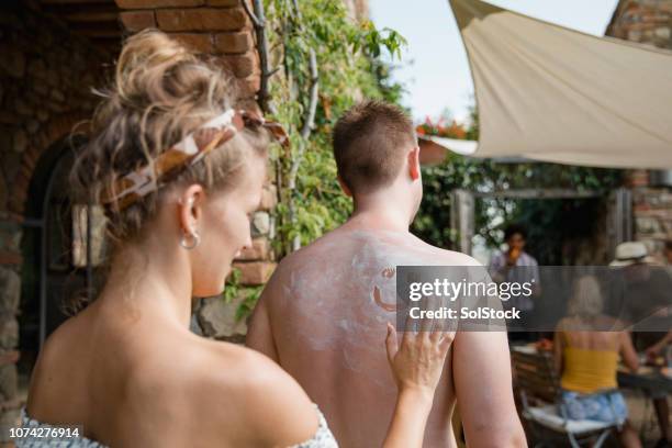 fun in the sun - sun tan stock pictures, royalty-free photos & images