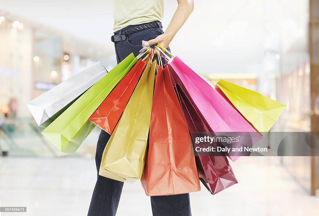 Woman carrying shopping bags