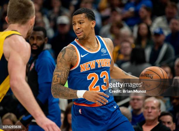 Trey Burke of the New York Knicks looks to pass the ball during the first half of the game against the Indiana Pacers at Bankers Life Fieldhouse on...