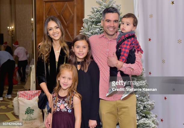 Jessica Alba, Haven Warren, Honor Warren Cash Warren, and Hayes Warren attend the Baby2Baby Holiday Party Presented by FRAME at Montage Beverly Hills...