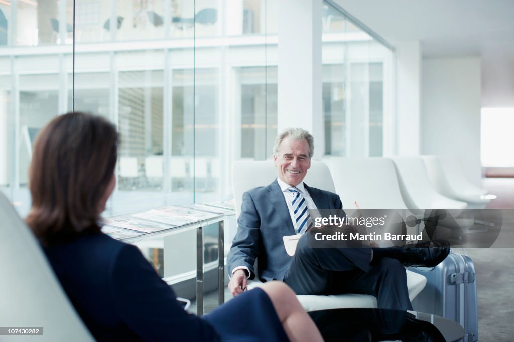 Business people waiting in airport