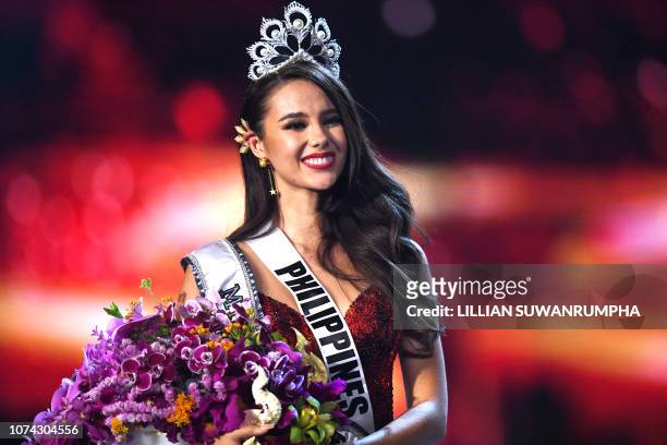 Catriona Gray of the Philippines smiles after being crowned the new Miss Universe 2018 on December 17, 2018 in Bangkok.