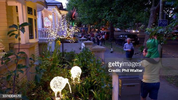 Houses on Franklin Road are lit with Christmas lights and decorations on December 15, 2018 in Auckland, New Zealand. It is the 25th year Franklin...