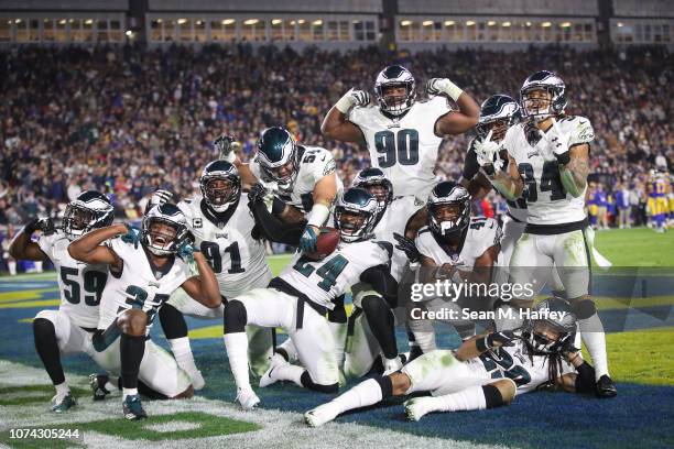 Philadelphia Eagles react after a fumble recovery in the third quarter against the Los Angeles Rams at Los Angeles Memorial Coliseum on December 16,...