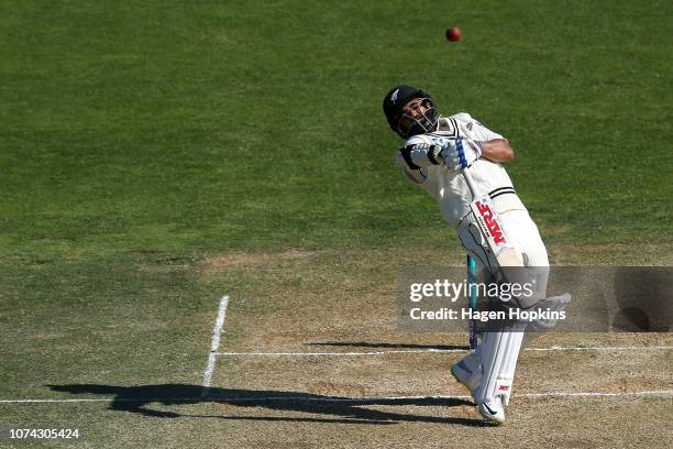 Ajaz Patel of New Zealand avoids a bouncer during day three of the First Test match in the series between New Zealand and Sri Lanka at Basin Reserve...