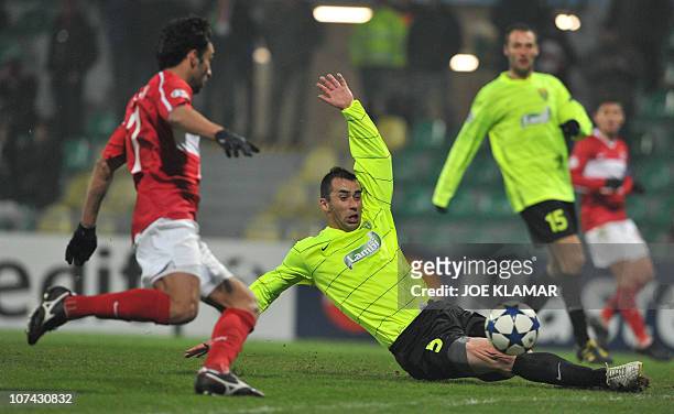 Lubomir Guldan of MSK Zilina fails to stop Ibson of Spartak Moscow scoring during their UEFA Champion's league group F match in Zilina on December 8,...